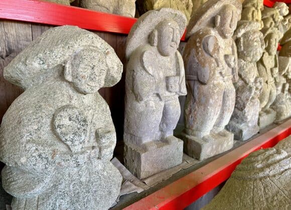 Ta no kami rice field god statues lined up