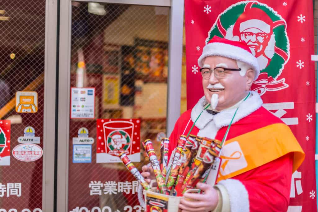 Kentucky Fried Chicken store in Japan with Colonel Sanders dressed as Santa.