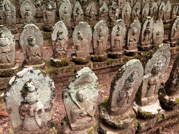 Jizō statues as home for the ghosts of those who died along the Nakasendo Way, Nagano.