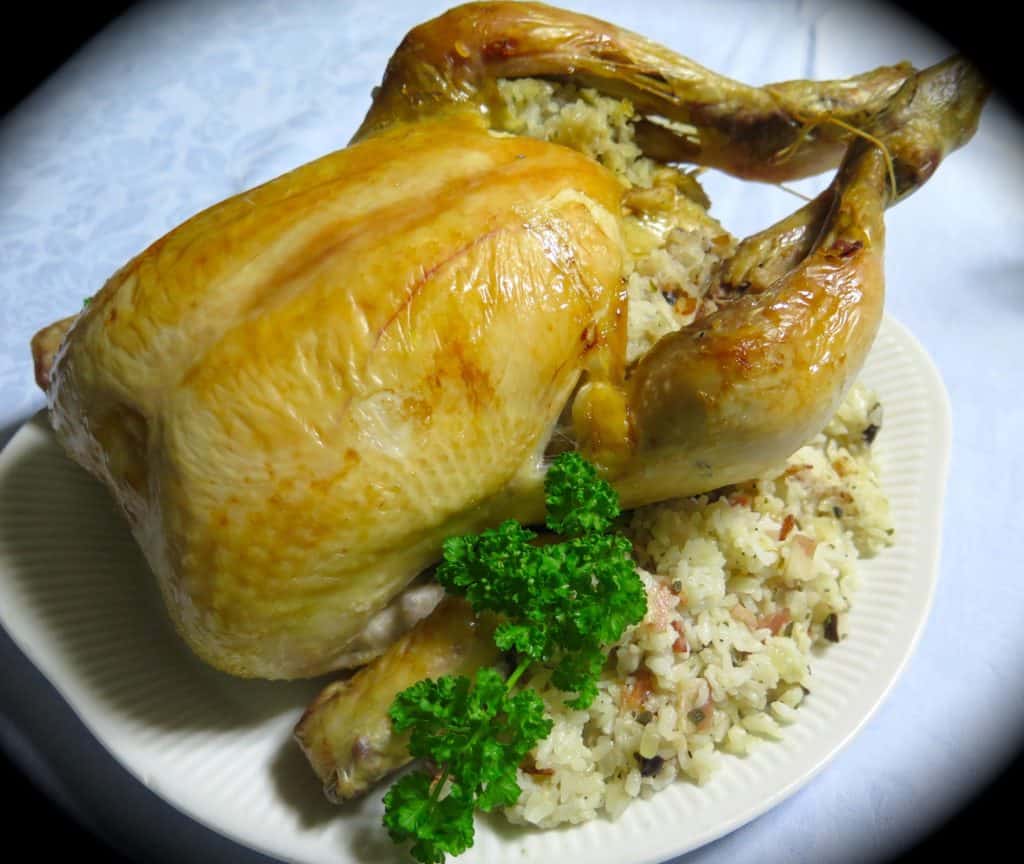 Chicken, roasted with stuffing, in the American tradition.