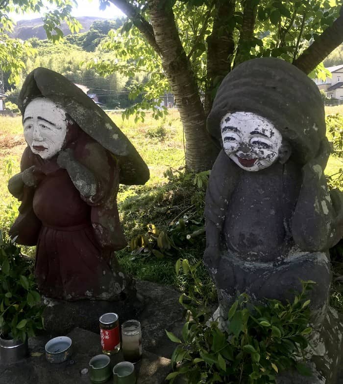 Rice field gods relaxing in the shade, Aira, Kagoshima