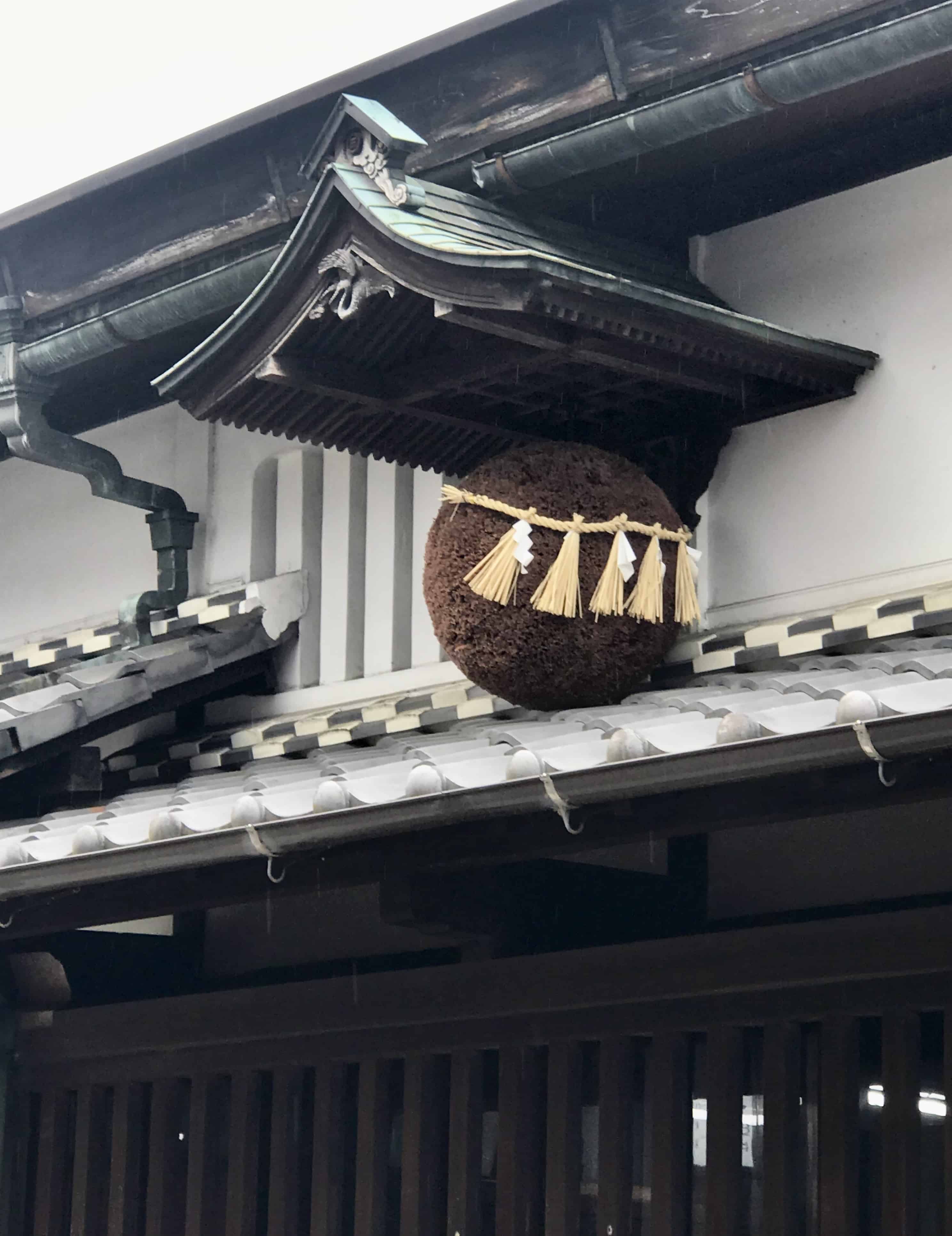 Cedar ball outside sake brewery