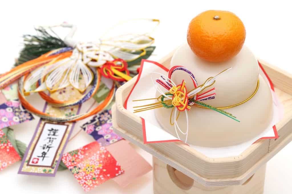 Japanese New Year's decorations, including kagami mochi which will be broken and eaten.