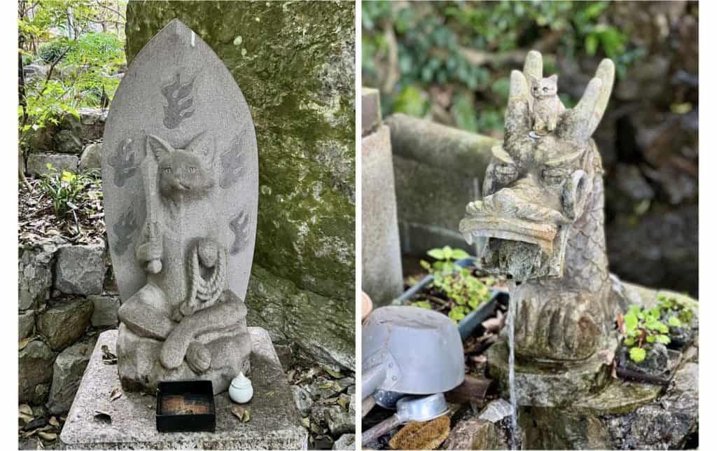 Cat Fudō Myōō Buddhist god. Statue of tiny kitten among 4 horns on the head of a dragon.