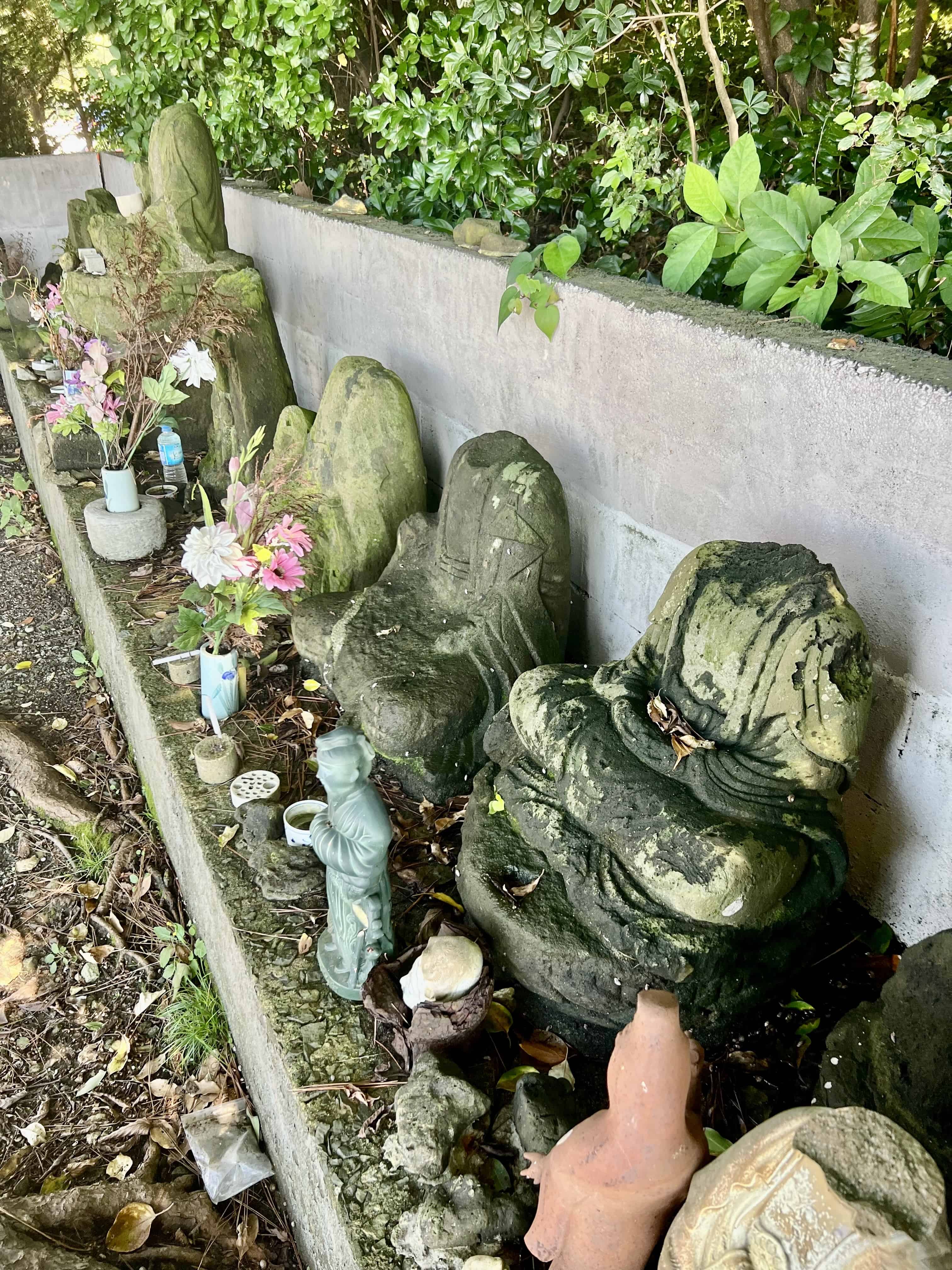 Buddhist statues whose heads have been hacked off during the persecution of Buddhism at the beginning of the Meiji period.