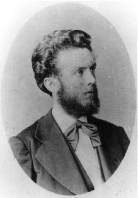 Black and white photo of bearded Dr. Neumann.