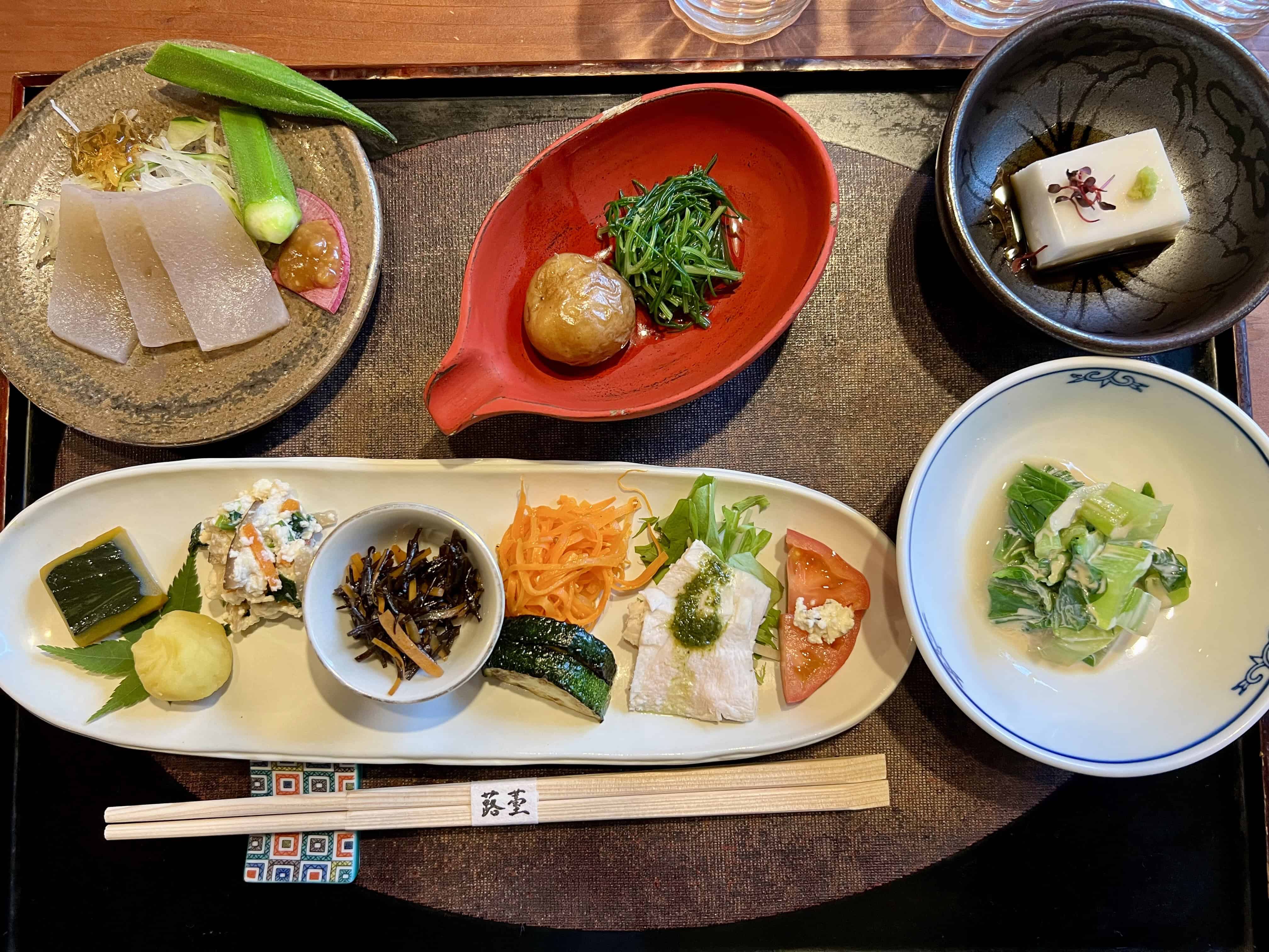 Japanese meal with many small dishes.