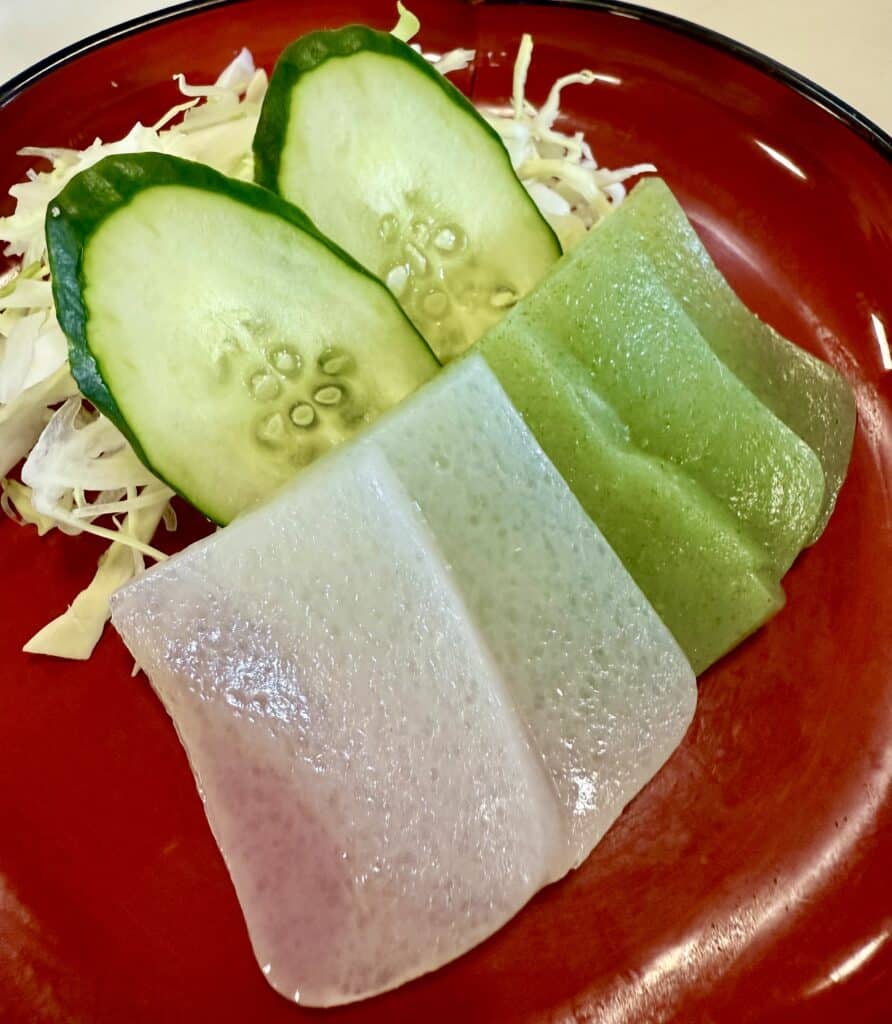 Konnyaku sliced with cucumbers and cabbage